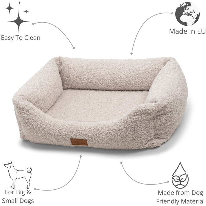Cream-colored dog lounger made from soft, durable materials, easy to clean and perfect for big and small dogs.