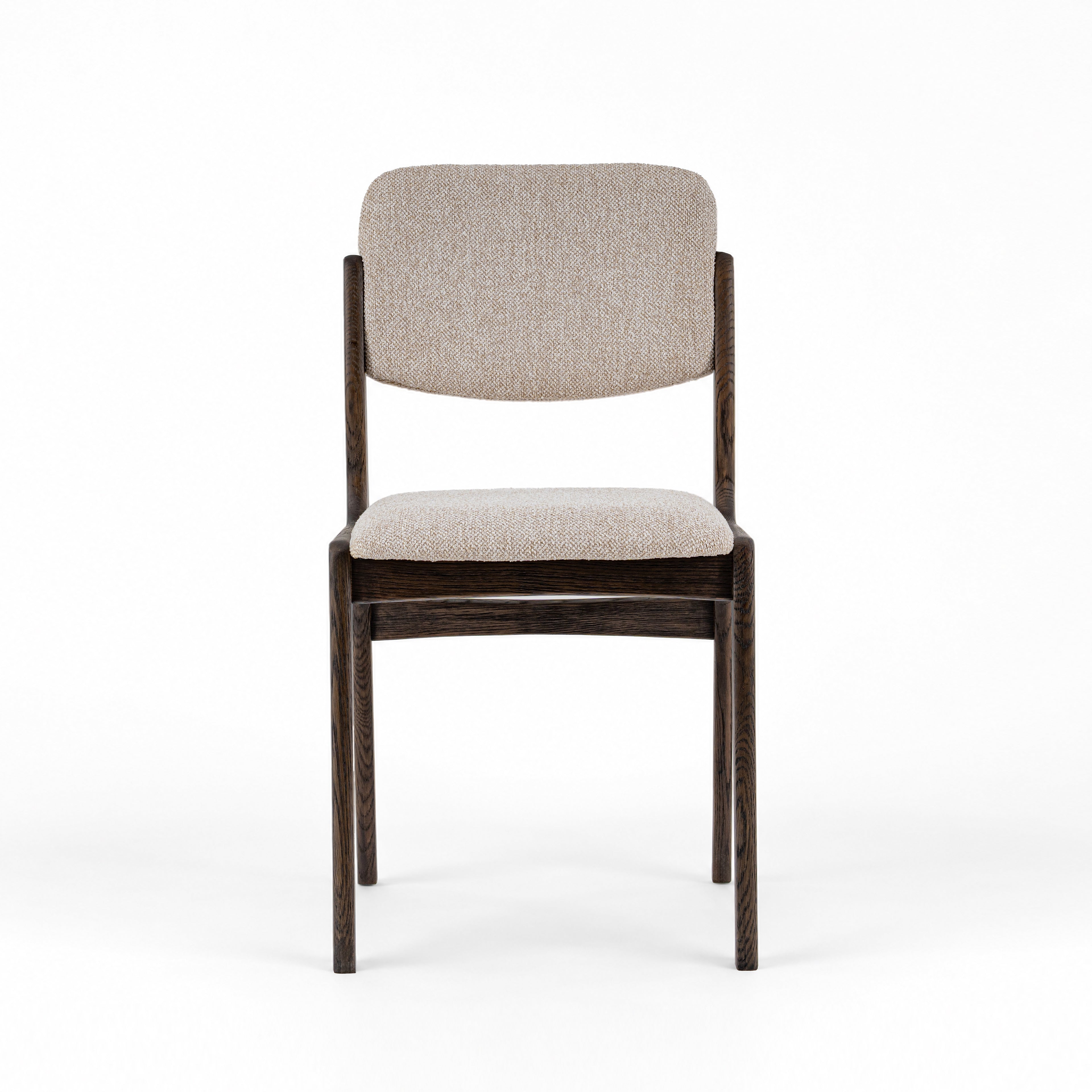 A modern dining chair with a dark brown wooden frame and light beige textured fabric upholstery on the seat and backrest, shown against a plain white background.