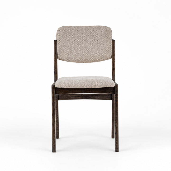 A modern dining chair with a dark brown wooden frame and light beige textured fabric upholstery on the seat and backrest, shown against a plain white background.