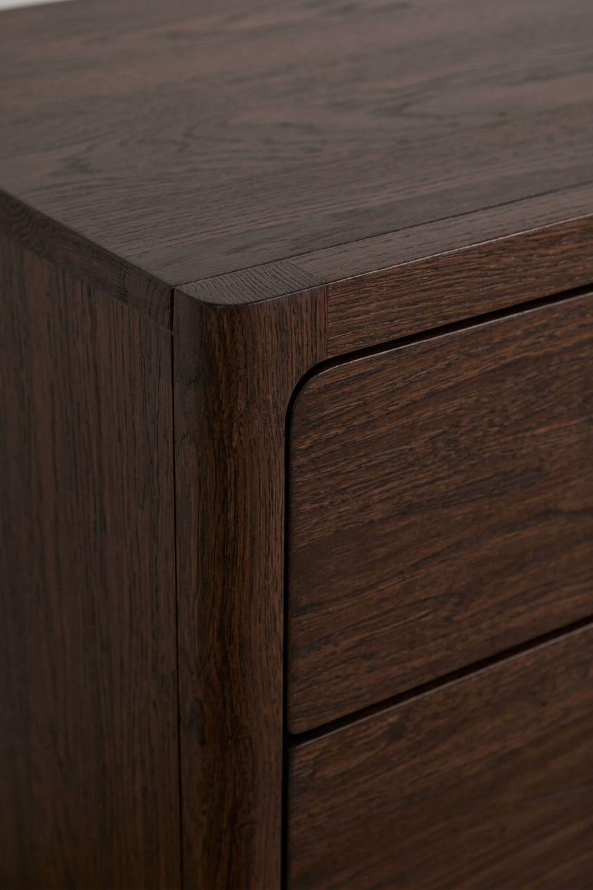 Close-up of Elin Espresso Oak Dresser corner showing premium oak grain and softly rounded edge detail