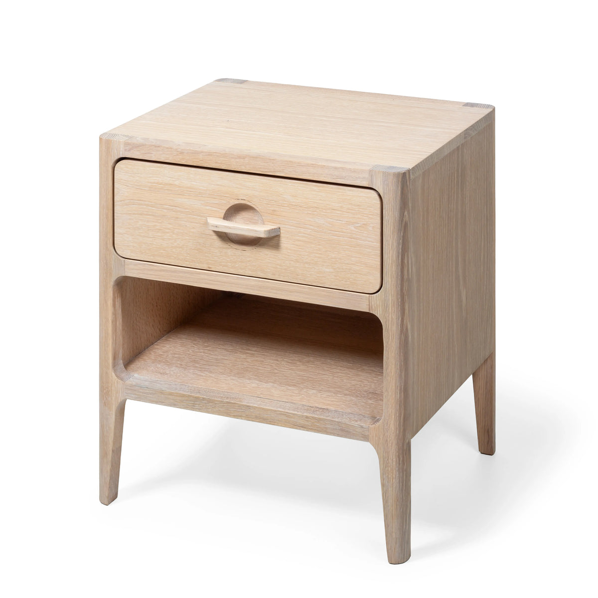 Angled closed - Elin solid oak nightstand with drawer and open shelf, three-quarter view