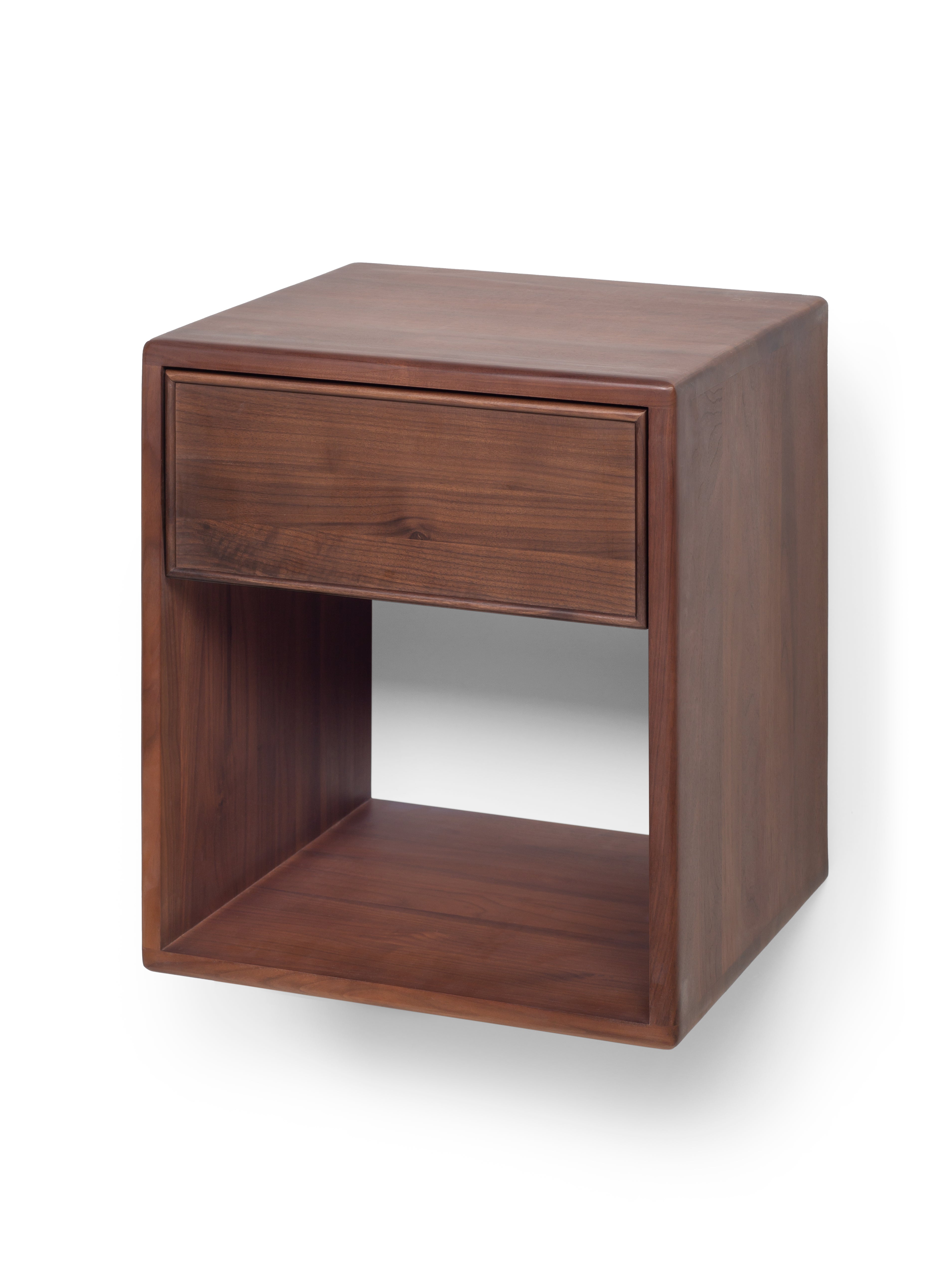 Wooden side table with a drawer on a white background