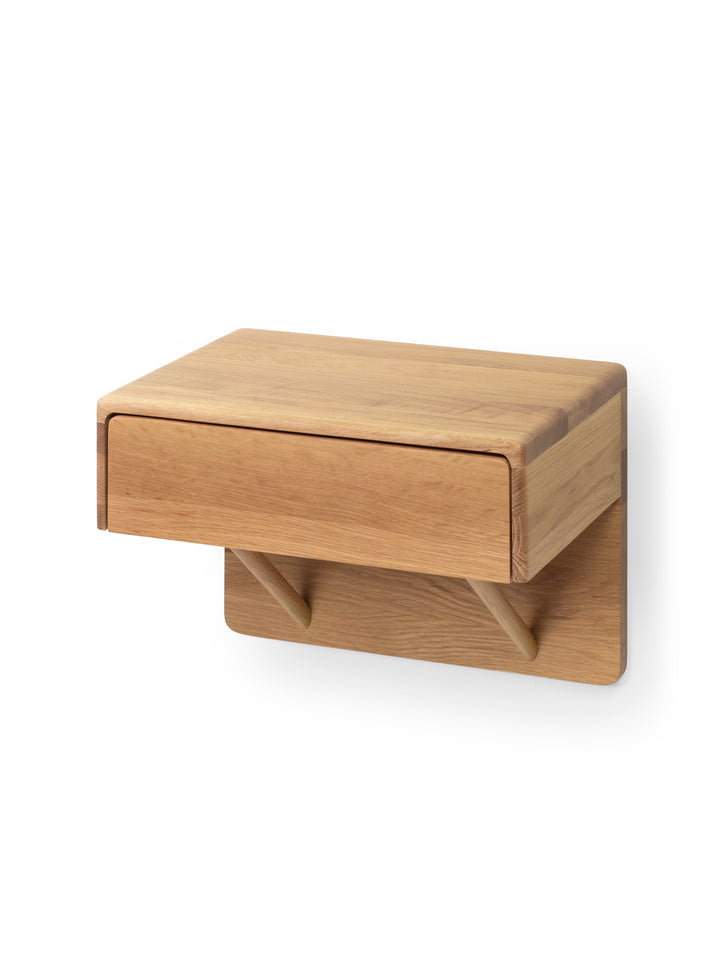 Angled product shot - Frank wall-mounted oak nightstand with drawer and open shelf, three-quarter angled view