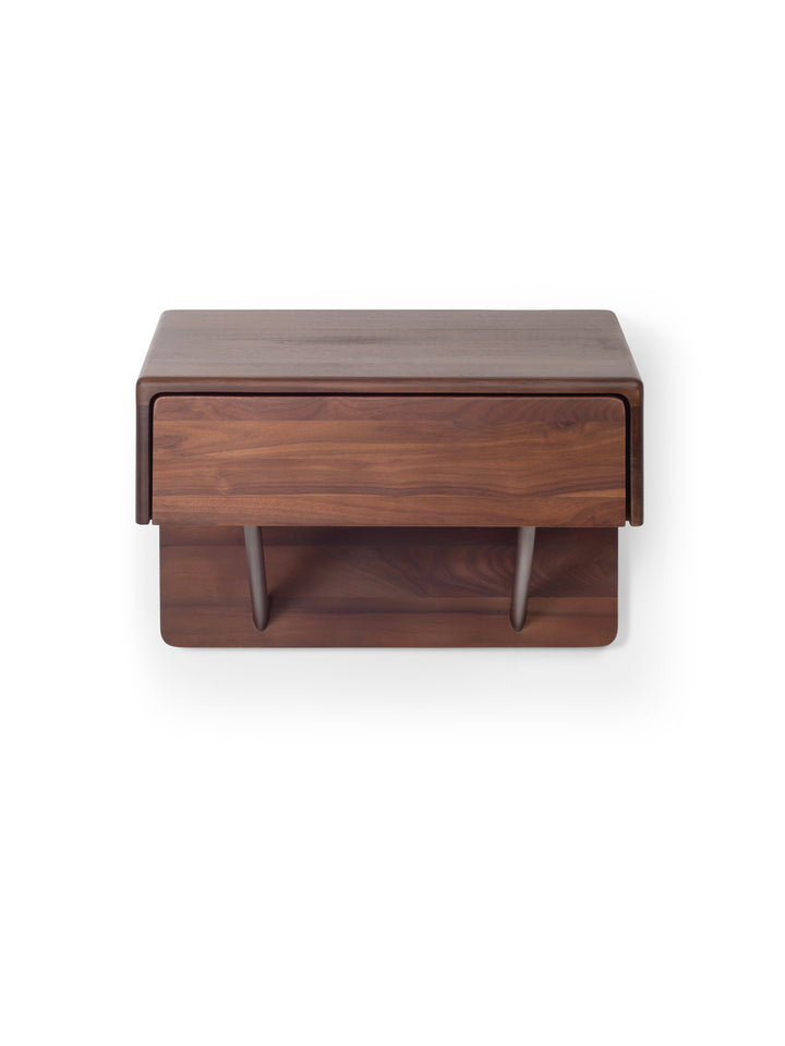 Wooden side table with a drawer on a white background