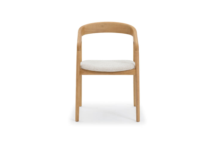 Elegant oak dining chair with soft cobble fabric upholstery and matte lacquer finish