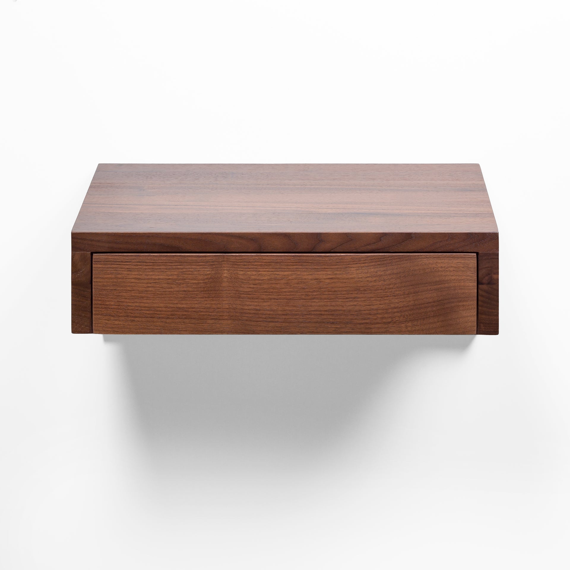 Modern walnut floating nightstand with compact drawer and elegant hardwood construction
