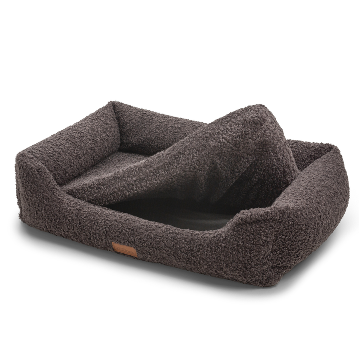 Gray orthopedic dog lounger with a removable and washable cover, designed for easy cleaning and durability.