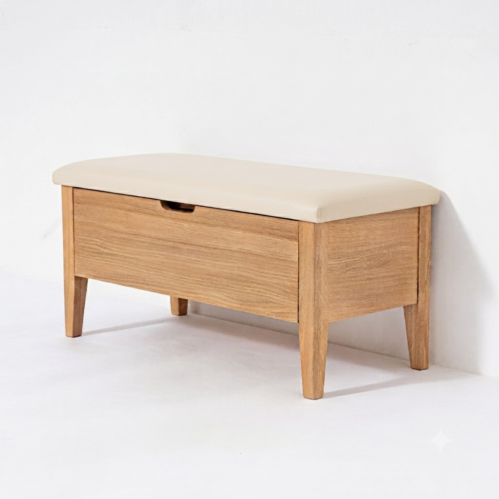A light oak wood storage bench with a cream-colored upholstered cushion on top and a single drawer, photographed against a plain white wall.