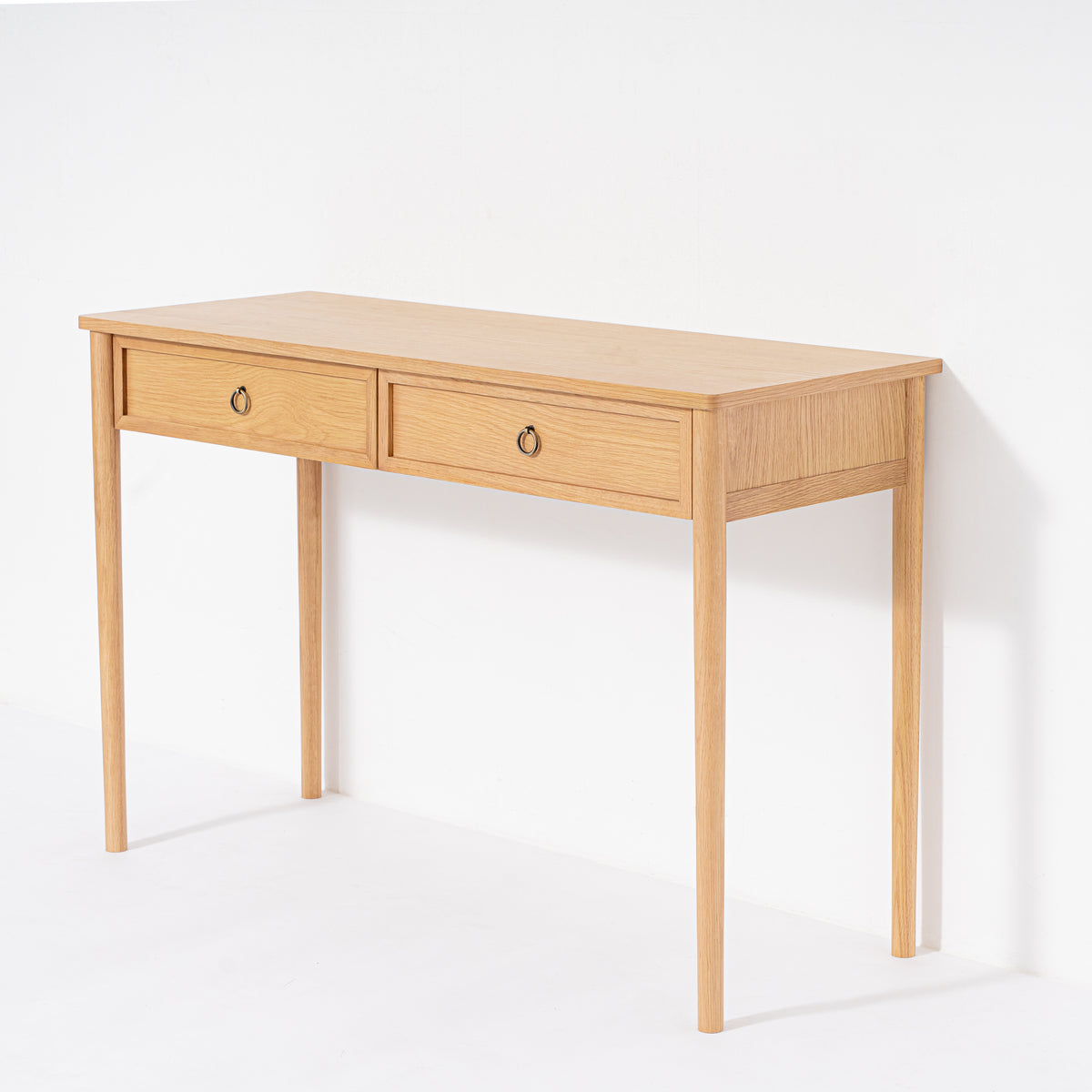 Wooden desk with two drawers on a white background