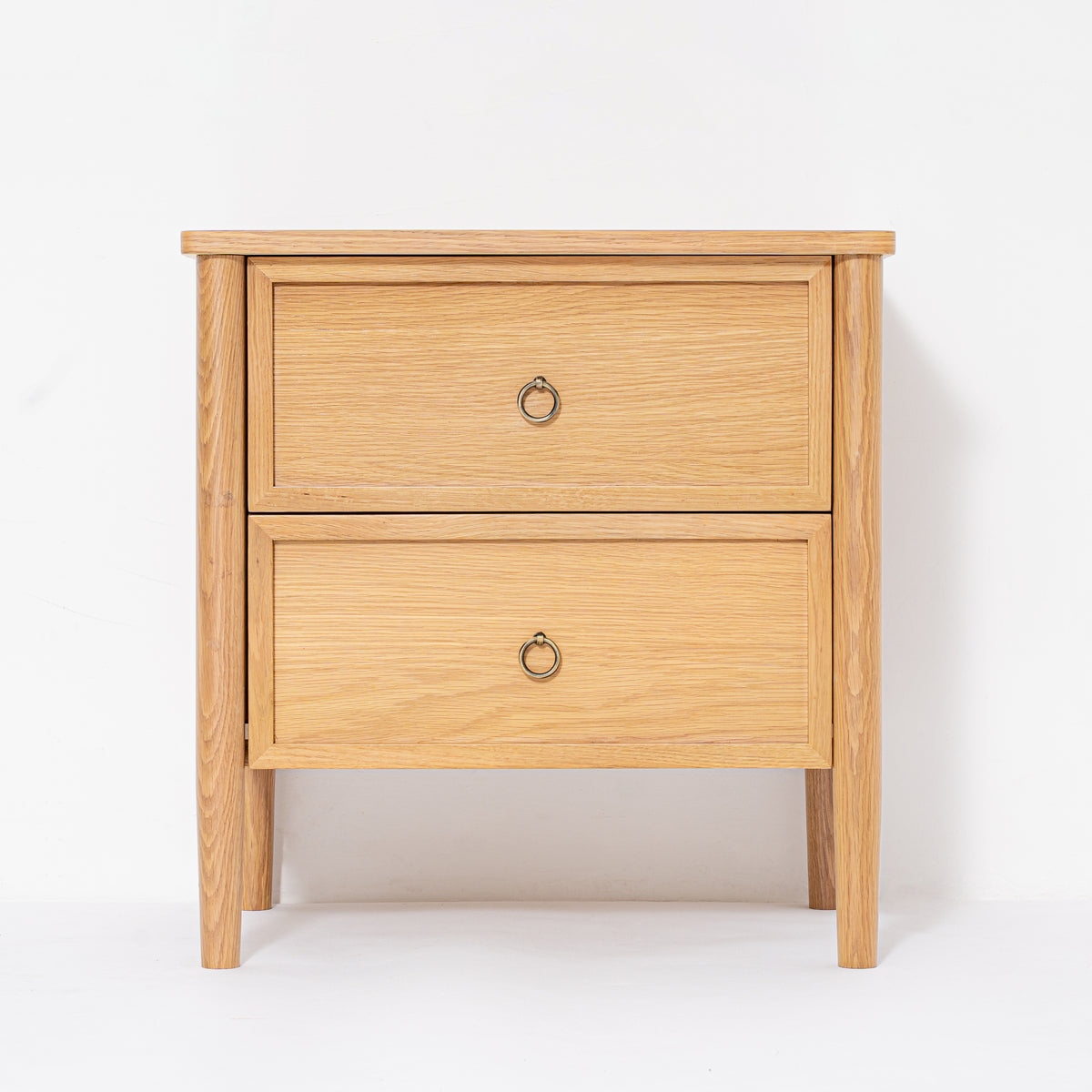 Wooden nightstand with two drawers on a white background