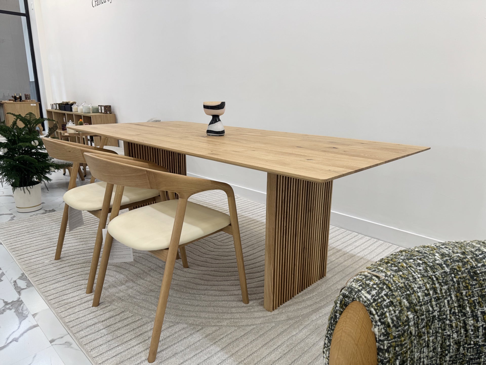 Rustic extendable solid oak table with artisanal craftsmanship and natural finish