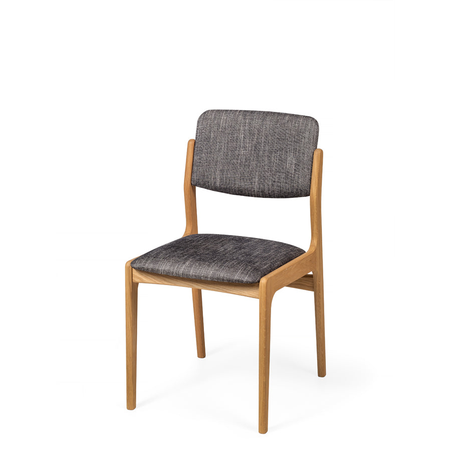 Scandinavian style oak wood chair with seat and backrest upholstered in gray fabric