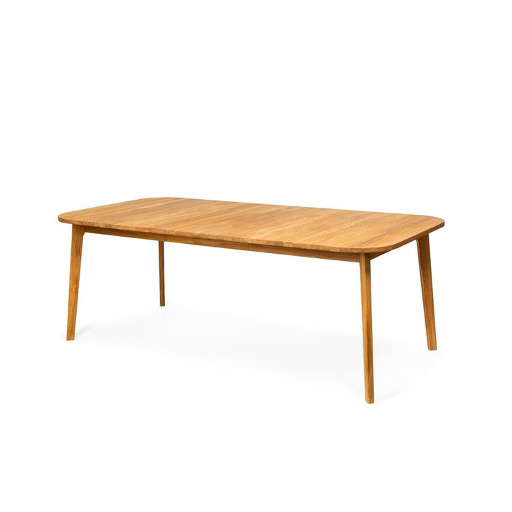 Artisanal solid oak dining table with extension mechanism and unique grain patterns