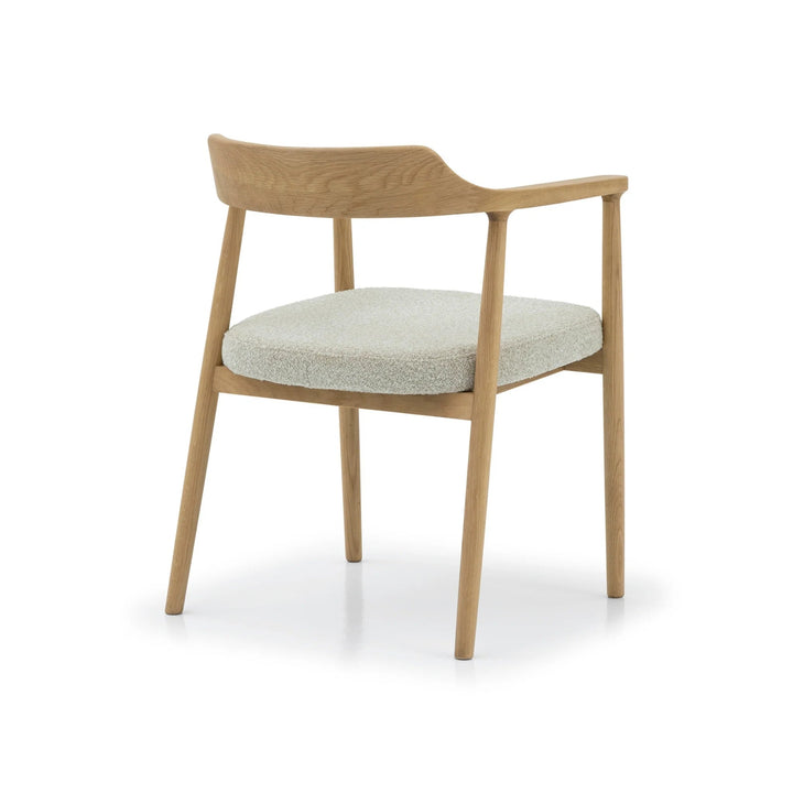 Bergen – Elegant Oak Dining Chair with natural oak frame, curved backrest, and light cushioned seat in minimalist Scandinavian design, gallery position 1.