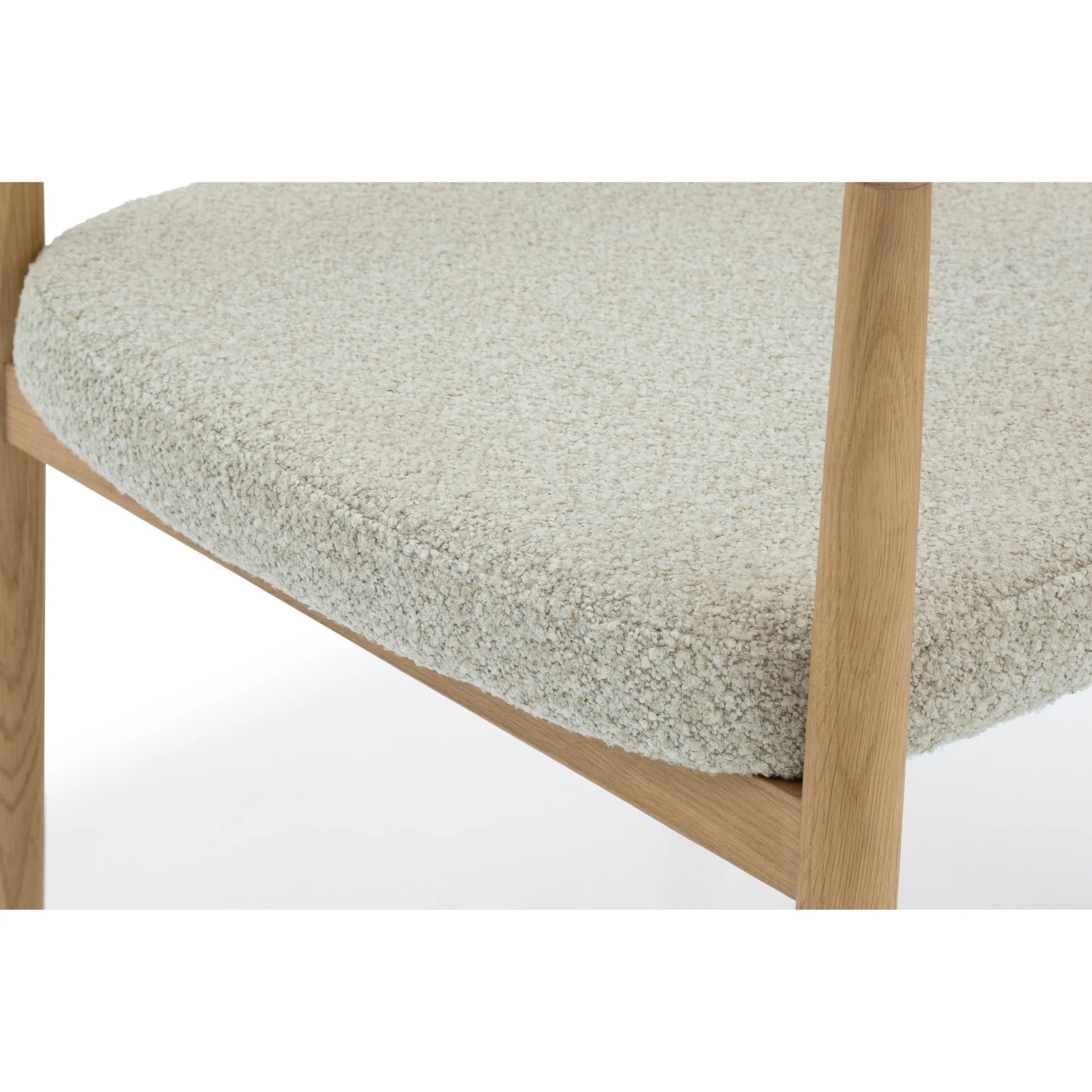 Bergen – Elegant Oak Dining Chair close-up of natural oak frame with textured light cushion in minimalist Scandinavian design, gallery position 1.