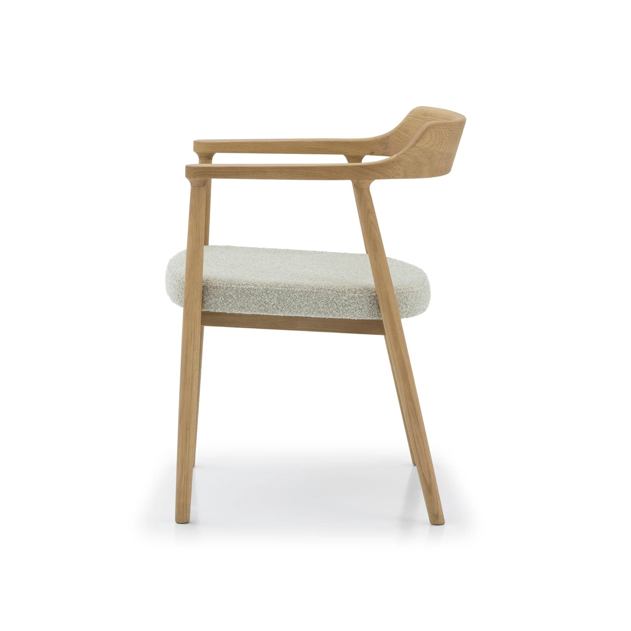 Modern oak dining chair with beige cushion and timeless handcrafted design