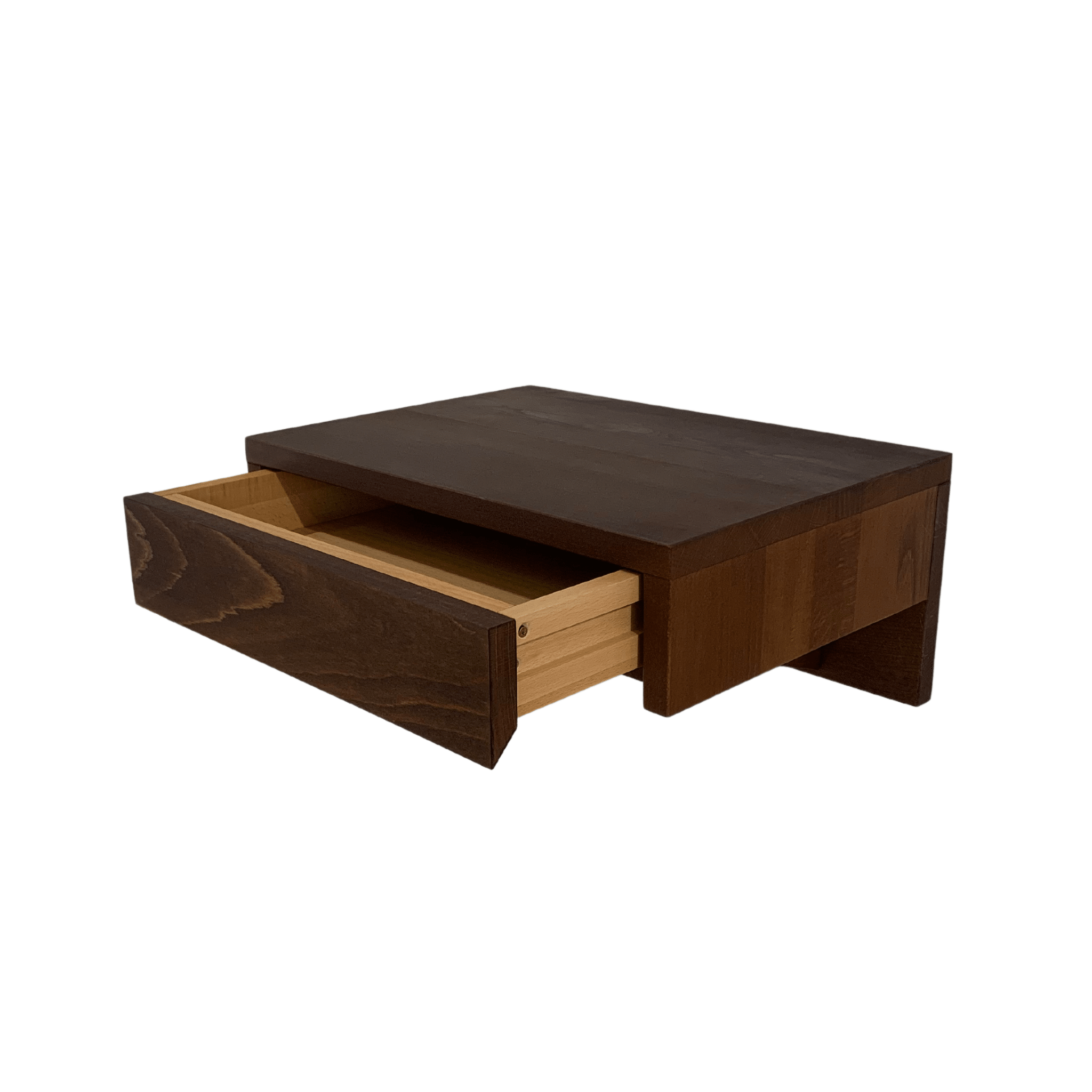 A modern bedside table with a drawer, mounted on the wall for a space-saving solution