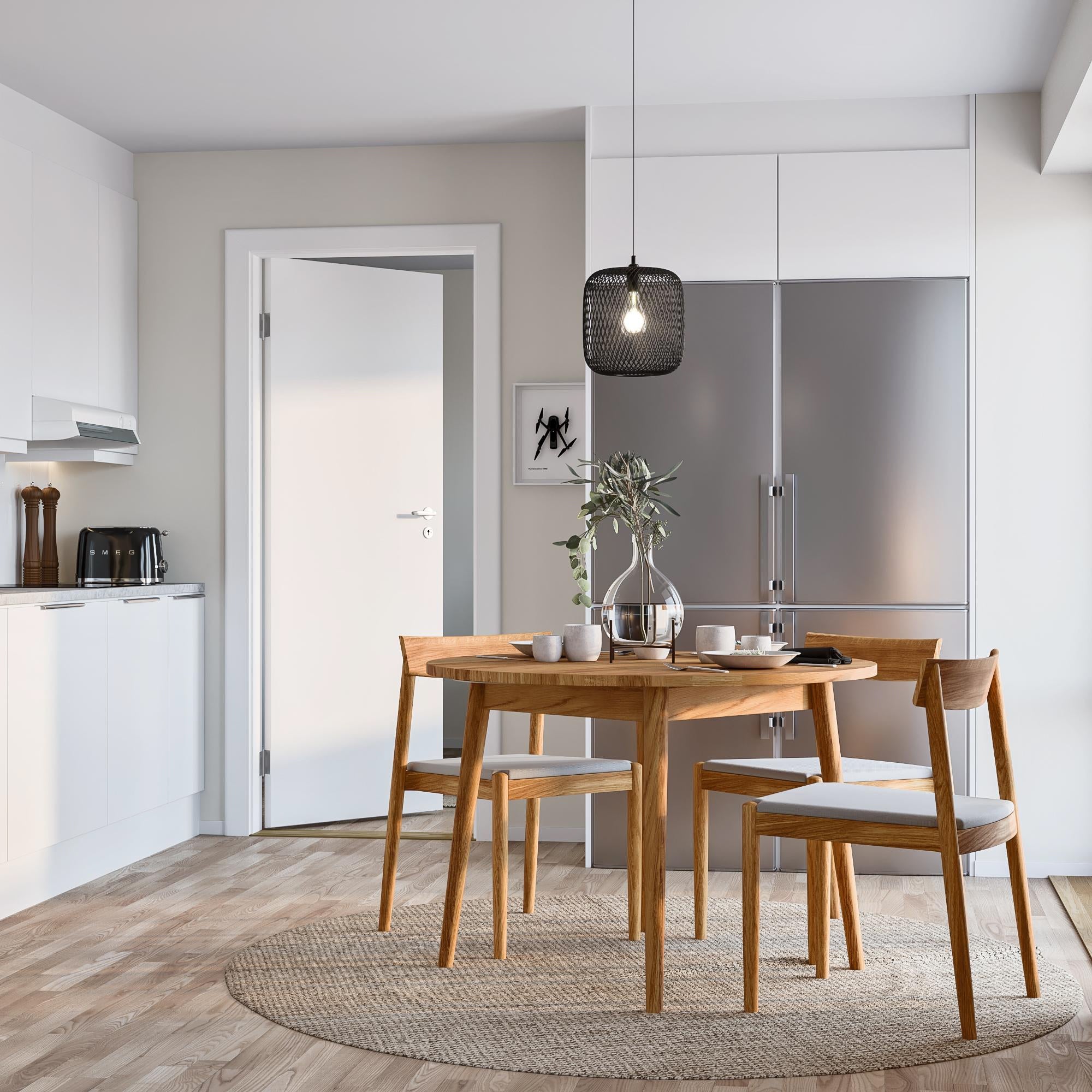 Solid oak round extendable table with artisanal craftsmanship and natural finish with Bo chairs