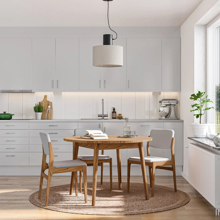 Bo round extendable solid oak dining table with oil-wax finish and natural wood grain