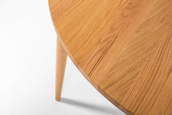 BO Round Extendable Dining Table – Handcrafted Solid Oak Hardwood with natural oil-wax finish, close-up of smooth surface and tapered leg in gallery 1 file KH_6097.jpg