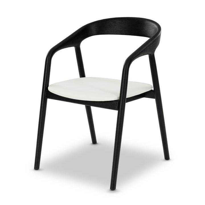 Celeste White Oak Dining Chair in Black Finish - curved solid oak frame and white leather seat cushion, angled view