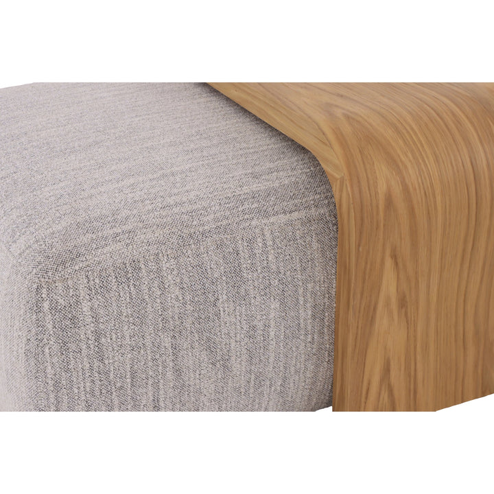 Celeste Oak Coffee Table with Poufs – Grey Fabric close-up of smooth solid oak table edge resting on textured grey fabric pouf, gallery position 1.