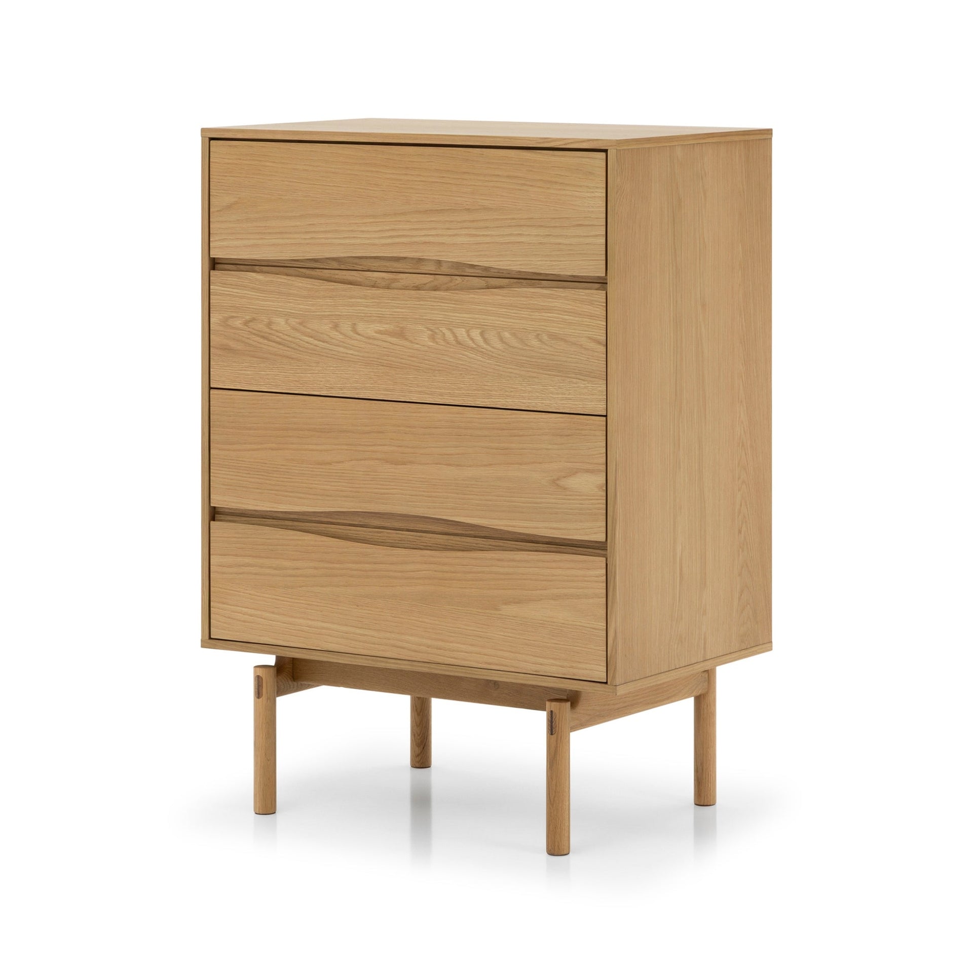 Celeste 4-Drawer Oak Dresser angled view on white background showing oak grain, carved handle grooves, and four round legs