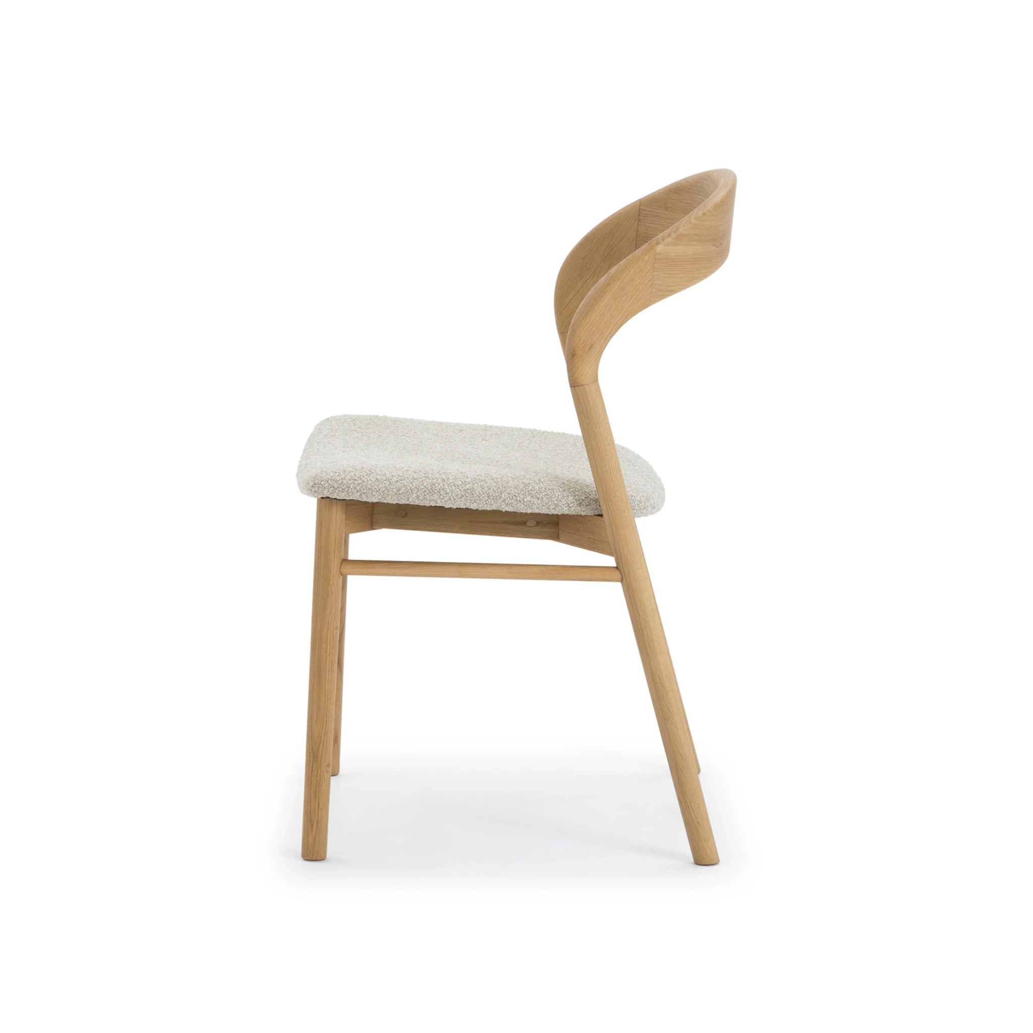 Side view of Celine - American Oak Wood Chair, Cobble fabric with curved oak backrest and textured light fabric seat