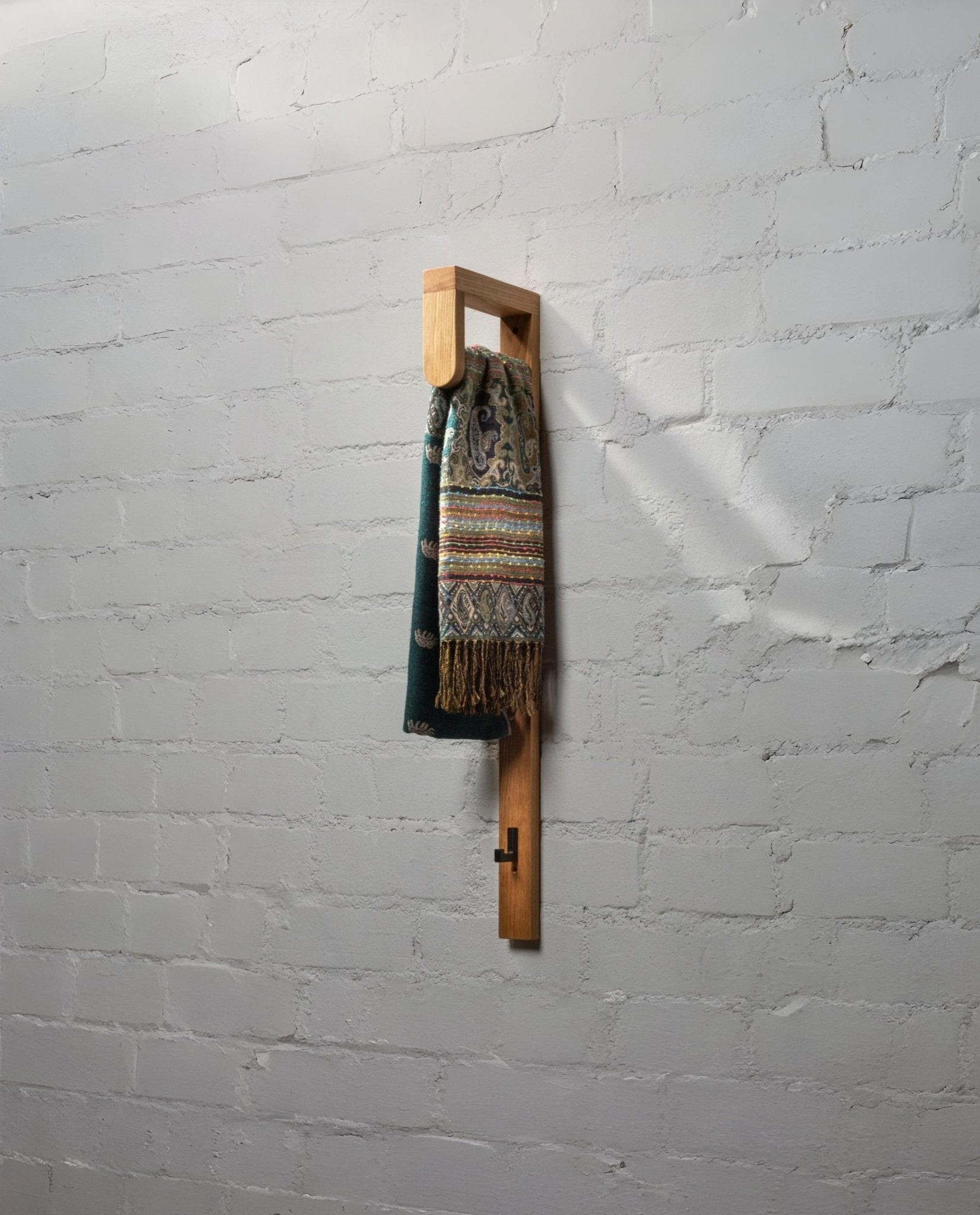 Modern solid oak floor-standing coat rack with slim design and matte lacquer finish