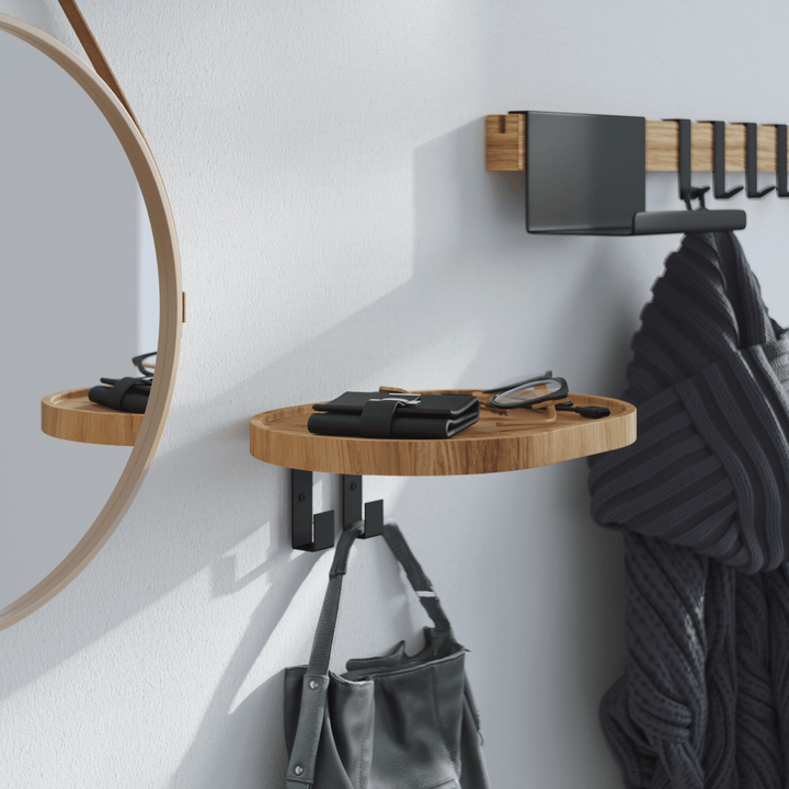 Woody solid oak wall-mounted coat rack with two metal hooks and circular tray shelf