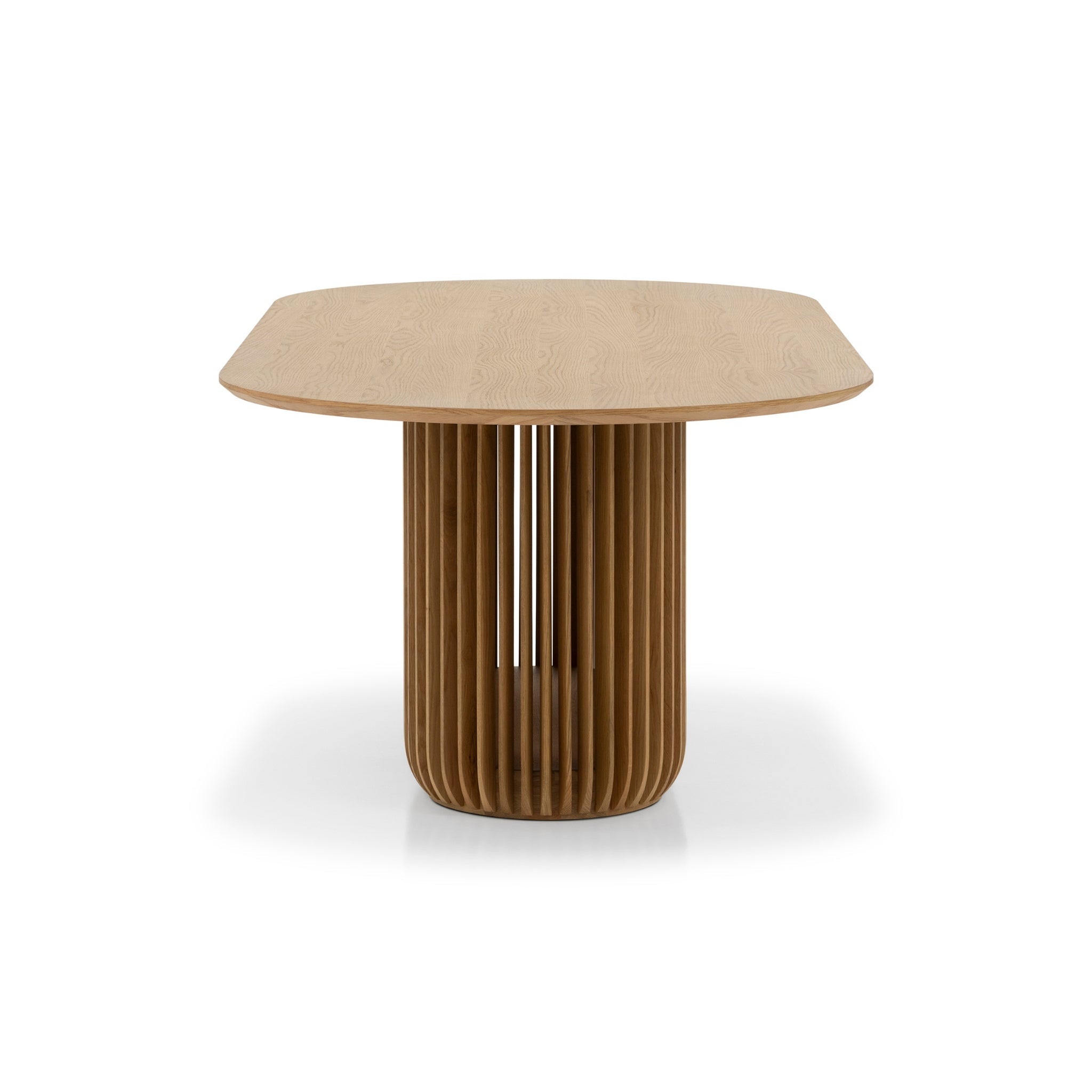 Dining Table Franz – Modern Oak Design with Natural Elegance in natural oak with distinctive ribbed base, minimalist Scandinavian style