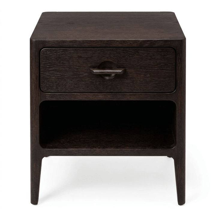 A dark brown wooden nightstand with a single drawer featuring a curved metal pull handle and an open shelf below, shown against a plain white background.