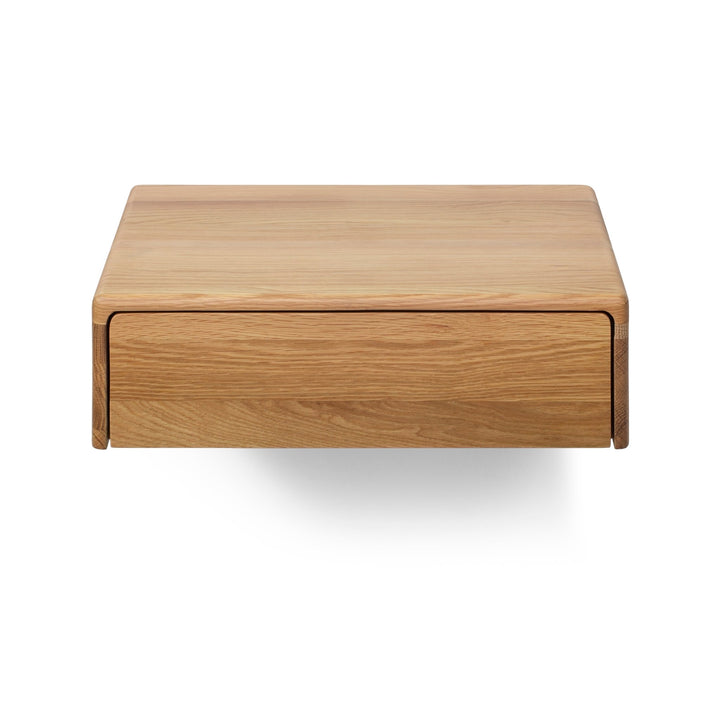 Frank American White Oak Nightstand - drawer pulled open showing hidden storage, solid oak frame, wall-mounted
