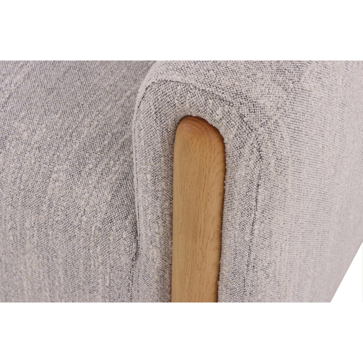 Franz – Light Grey Fabric Armchair with Oak Legs close-up on fabric texture and smooth natural oak wood armrest detail, gallery position 1, Tugitool-Franz-Hall-kangas-6.webp