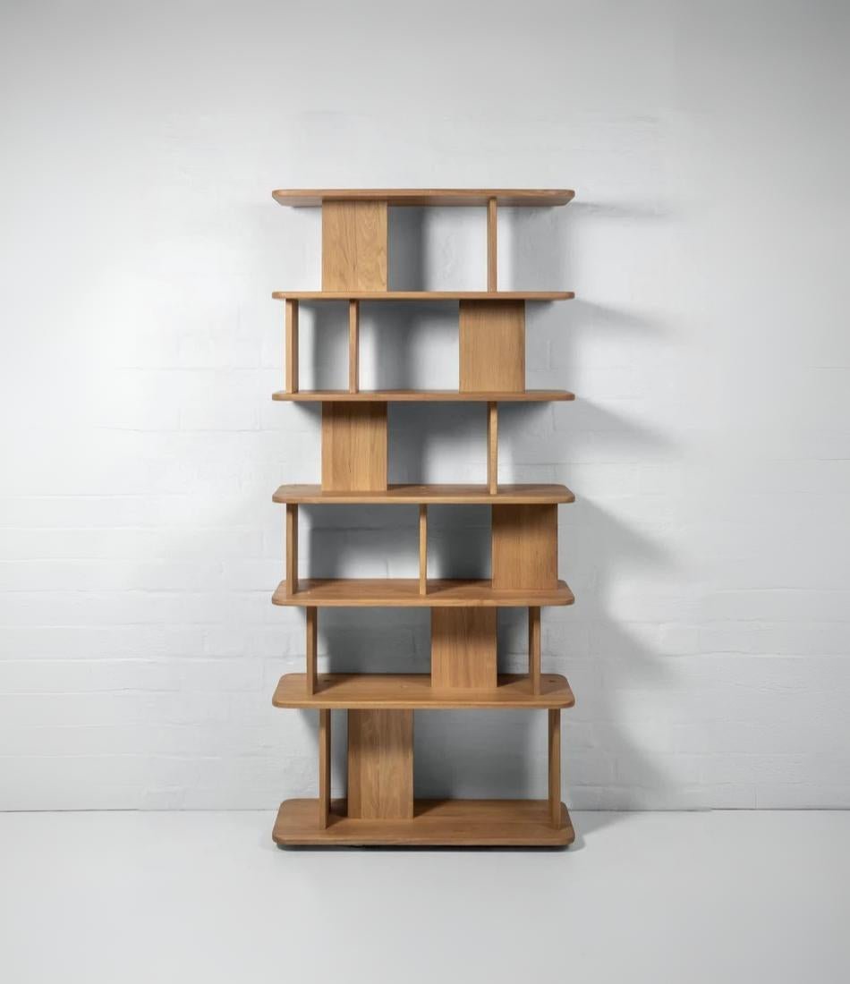 Solid oak room divider bookshelf with open shelves and minimalist contemporary style