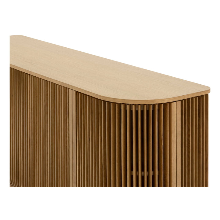 Franz Oak Sideboard close-up of rounded top edge and vertical ribbed solid oak doors in minimalist Scandinavian design, gallery position 1.