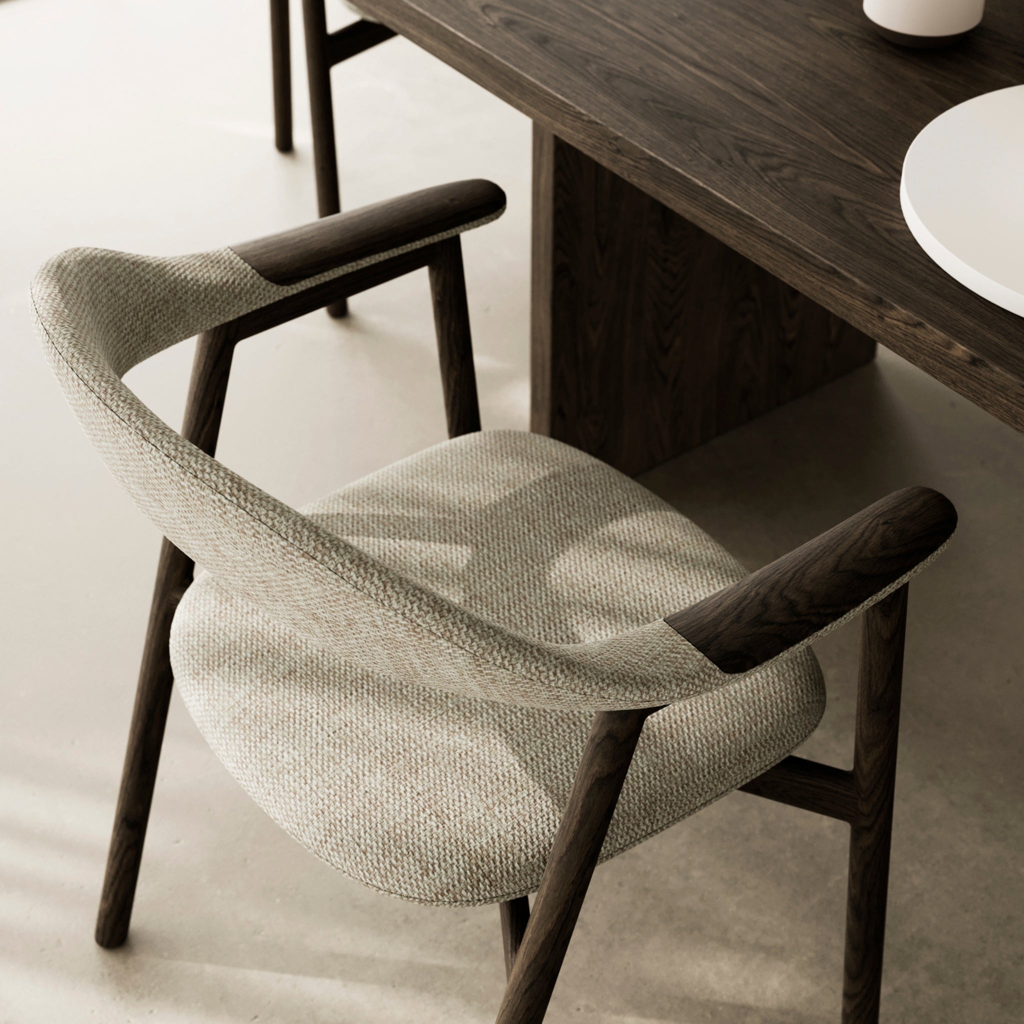 Solid oak dining chair with curved backrest, Vico patterned upholstery, and dark espresso finish