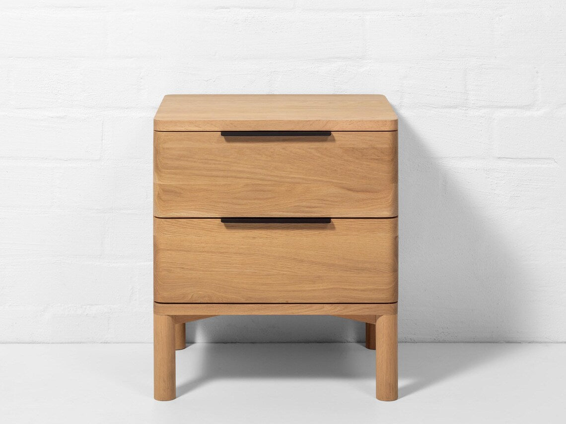 Solid oak nightstand in natural matte finish with soft-close storage drawers