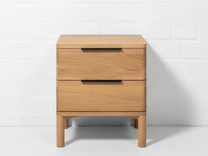 Solid oak nightstand in natural matte finish with soft-close storage drawers