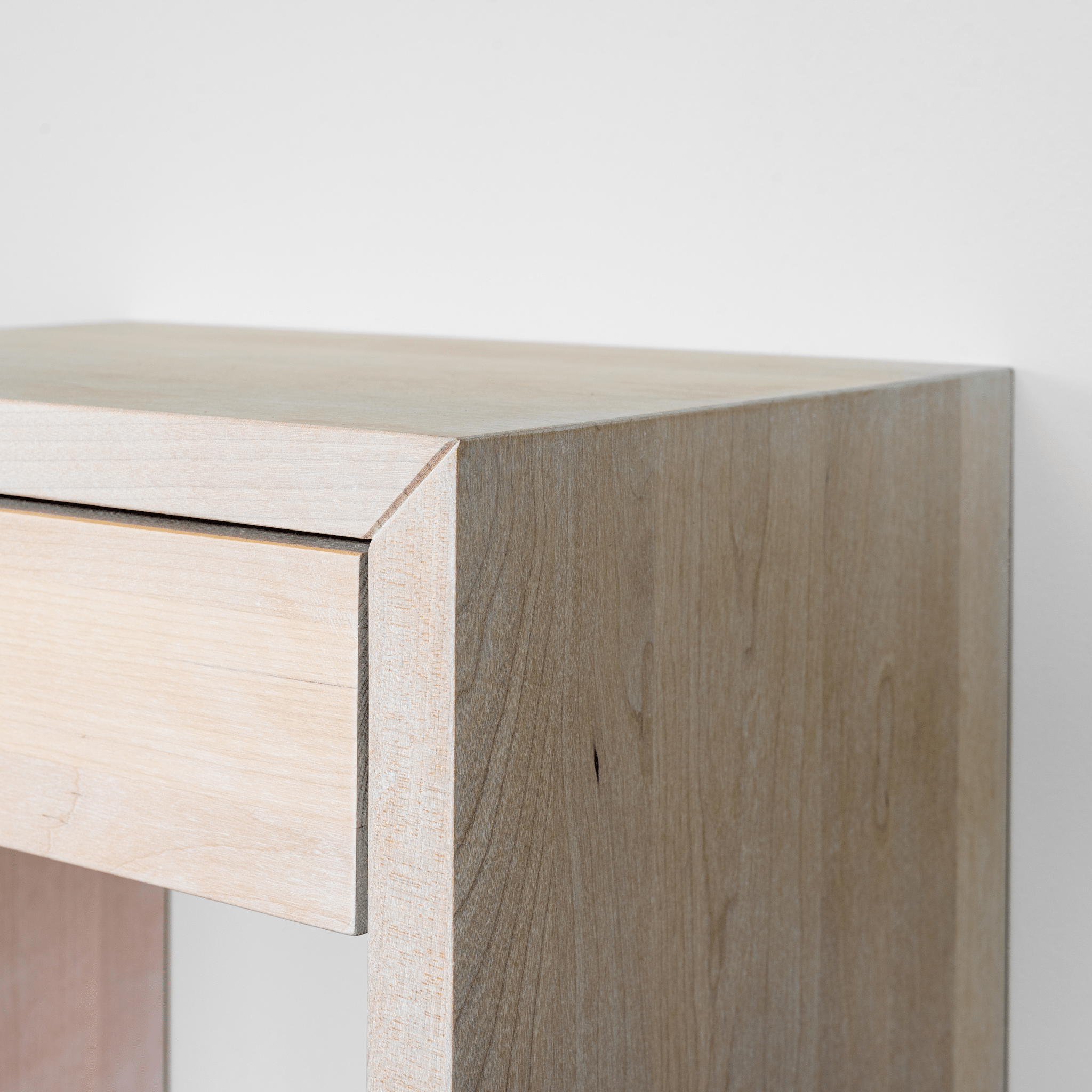 Whitewashed floating nightstand with solid beech construction, pull-out drawer and lower shelf