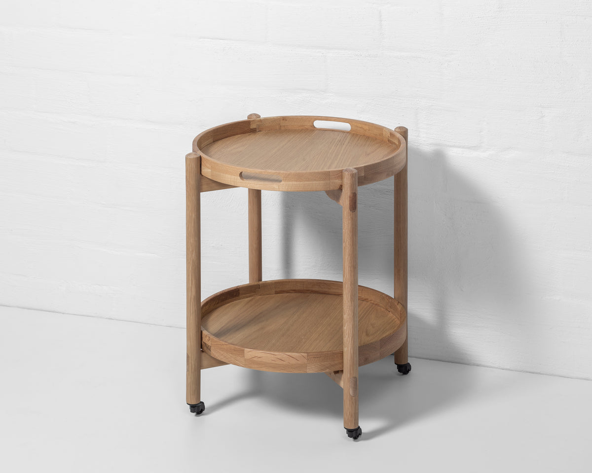 Wooden Serving Table Hugo - Oak in natural oak wood with round trays, two-tier design, and caster wheels
