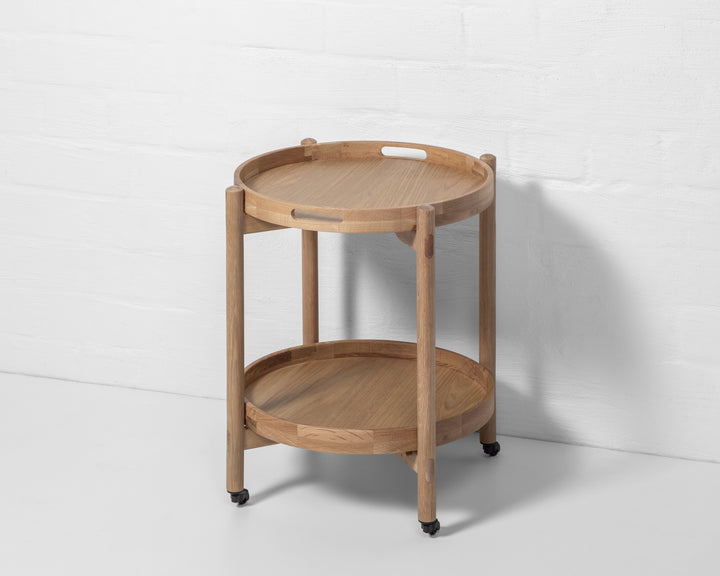 Wooden Serving Table Hugo - Oak in natural oak wood with round trays, two-tier design, and caster wheels