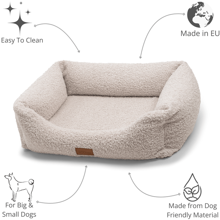 Cream-colored dog lounger made from soft, durable materials, easy to clean and perfect for big and small dogs.