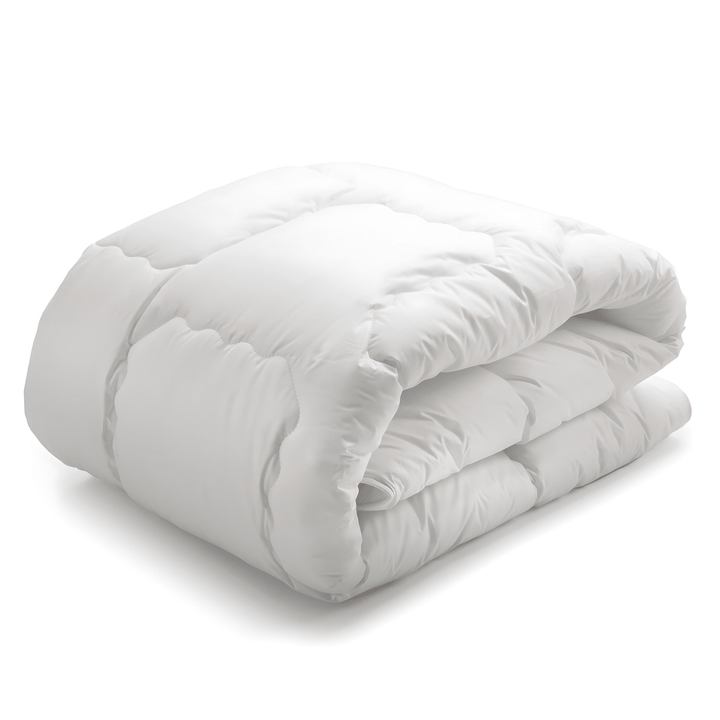 Year-round king-size Primaloft comforter, breathable cotton shell, soft and machine washable