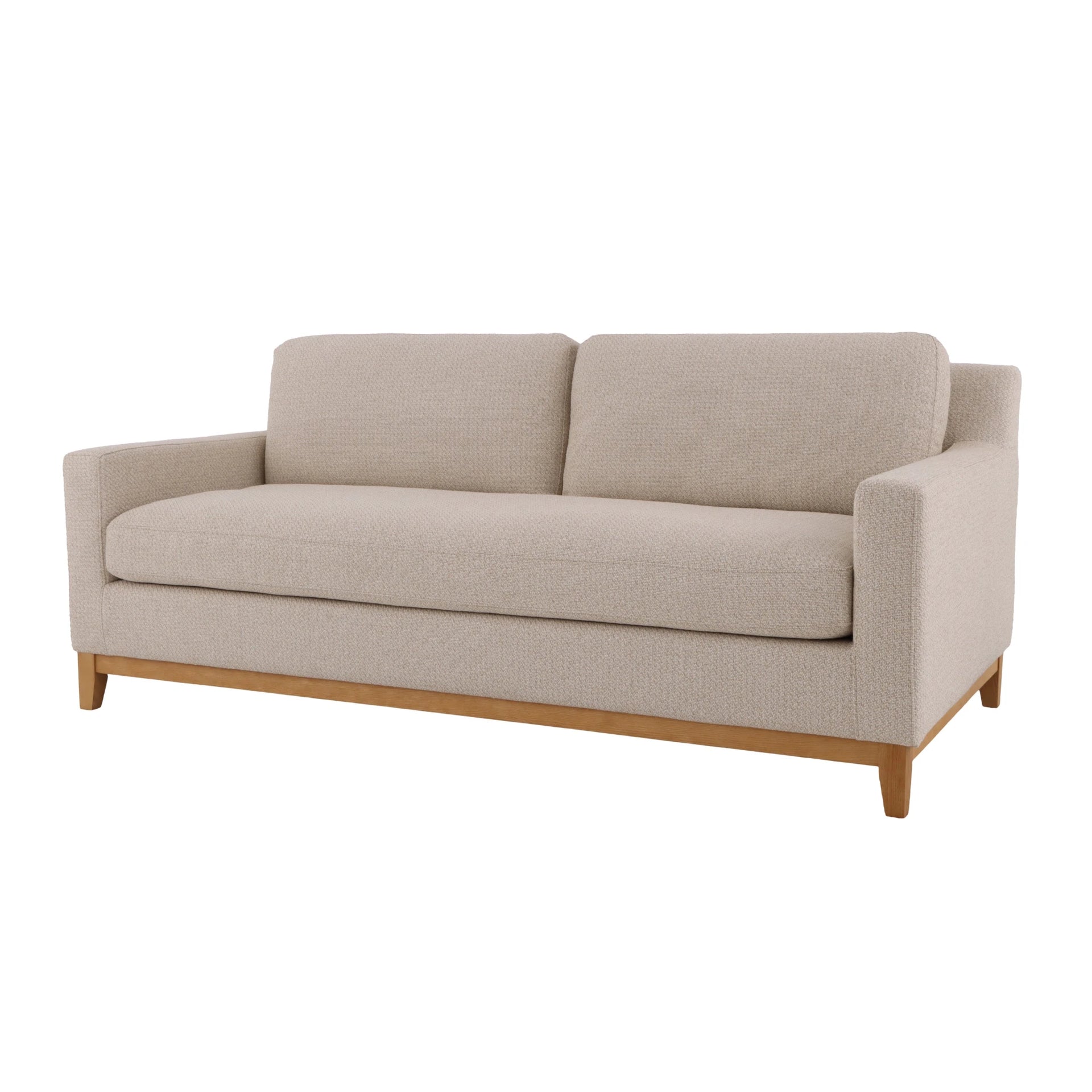 Tommy Pull-Out Wooden Sofa - soft beige Nature fabric upholstery and solid oak base, compact form, angled view