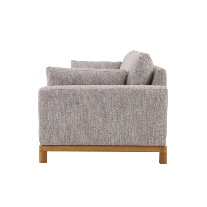 Light grey Leigh fabric couch with natural oak wood base and soft cushions