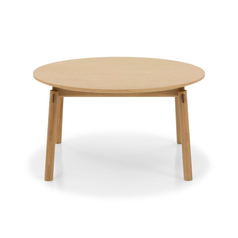 Natural Oak Wood Coffee Table Celeste with round top and sturdy angled legs in minimalist solid oak Scandinavian design, gallery position 1.