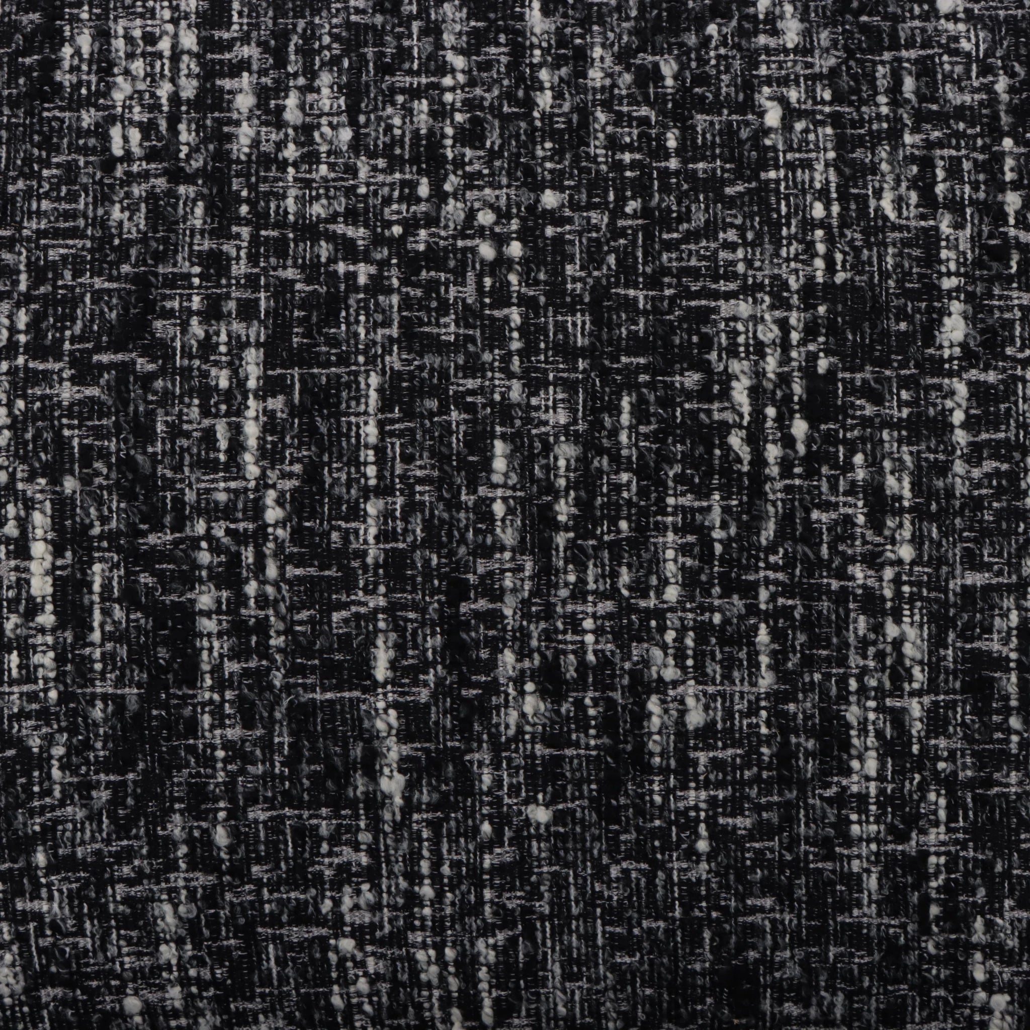 Nature – Black Fabric Armchair with Oak Legs close-up on textured black-and-white woven fabric detail, gallery position 1, Tugitool-Nature-Must-kangas-9.webp