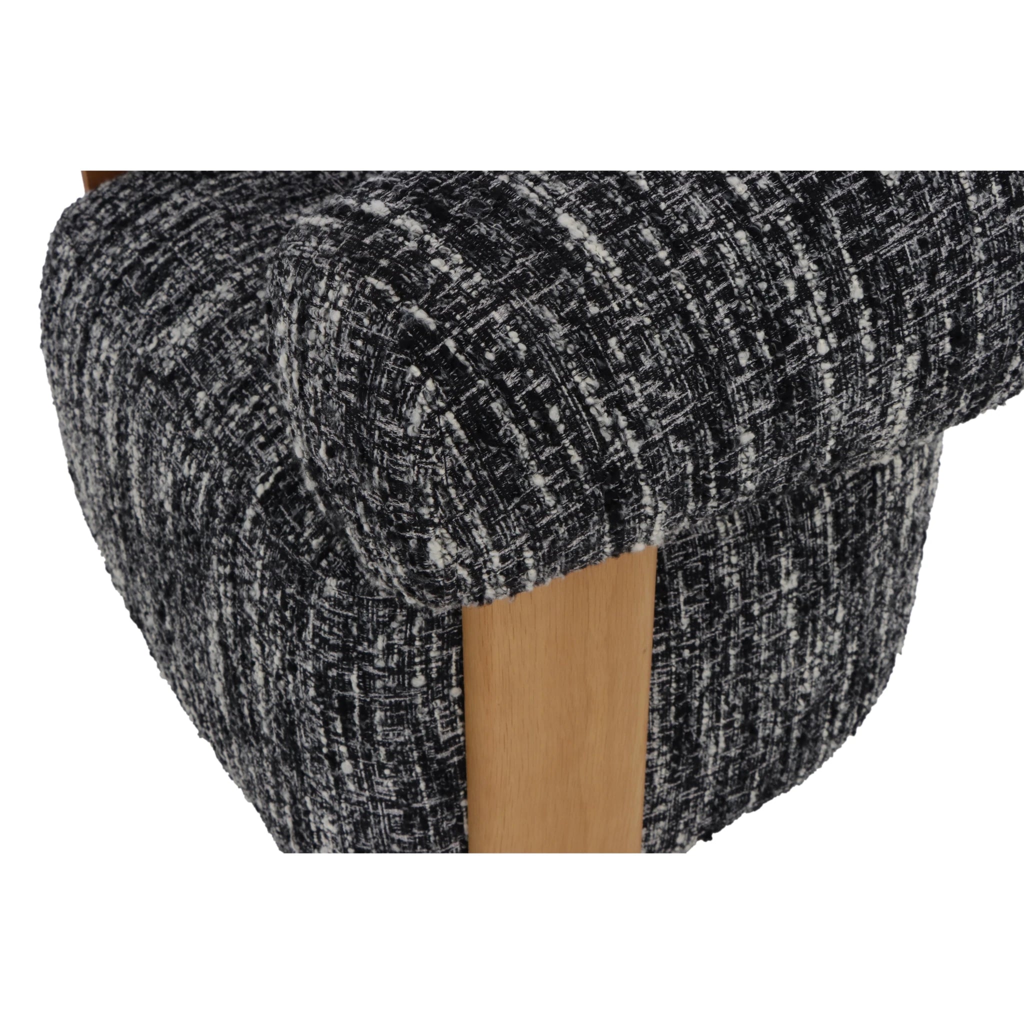 Nature – Black Fabric Armchair with Oak Legs close-up on textured black-and-white fabric and solid natural oak leg, gallery position 1, Tugitool-Nature-Must-kangas-8.webp