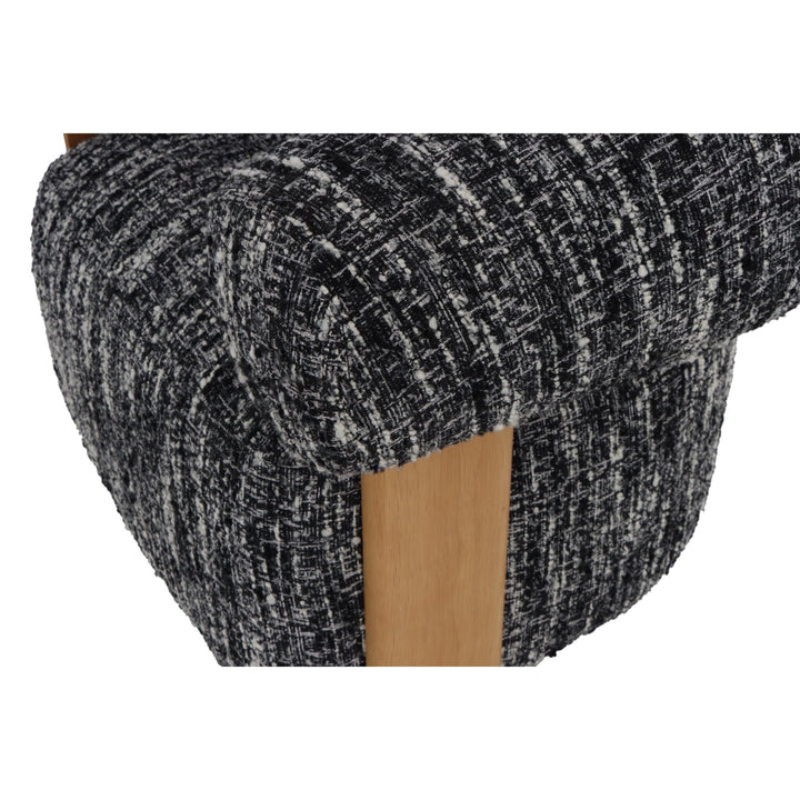 Nature – Black Fabric Armchair with Oak Legs close-up on textured black-and-white fabric and solid natural oak leg, gallery position 1, Tugitool-Nature-Must-kangas-8.webp